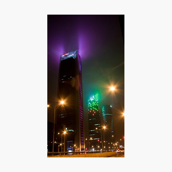 Item preview, Vibrant Madrid Towers: Nighttime Urban Glow Starbursts designed and sold by Clavivs.