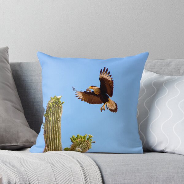 Item preview, Crested Caracara Bird In Flight And Saguaro Cactus designed and sold by simonjayphotos.