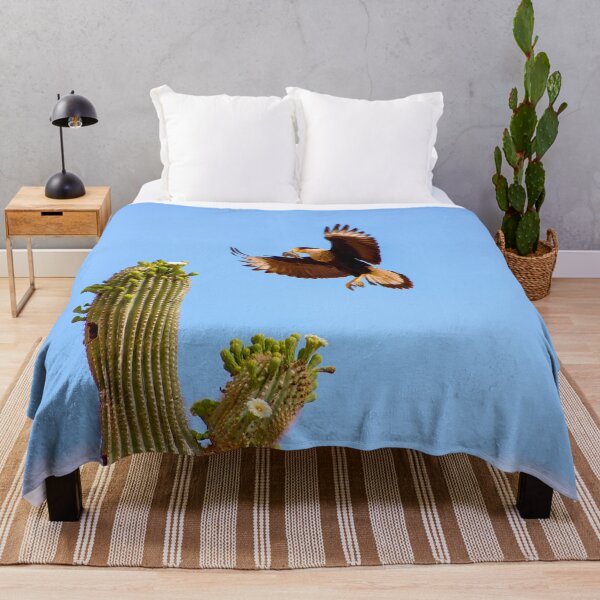 Item preview, Crested Caracara Bird In Flight And Saguaro Cactus designed and sold by simonjayphotos.