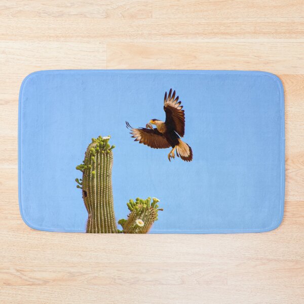 Item preview, Crested Caracara Bird In Flight And Saguaro Cactus designed and sold by simonjayphotos.