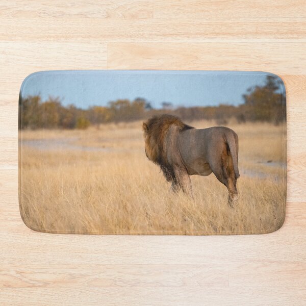 Item preview, Lone King at Dusk — Sekoti Walking Into the Golden Savuti Light designed and sold by DavideAntoniani.
