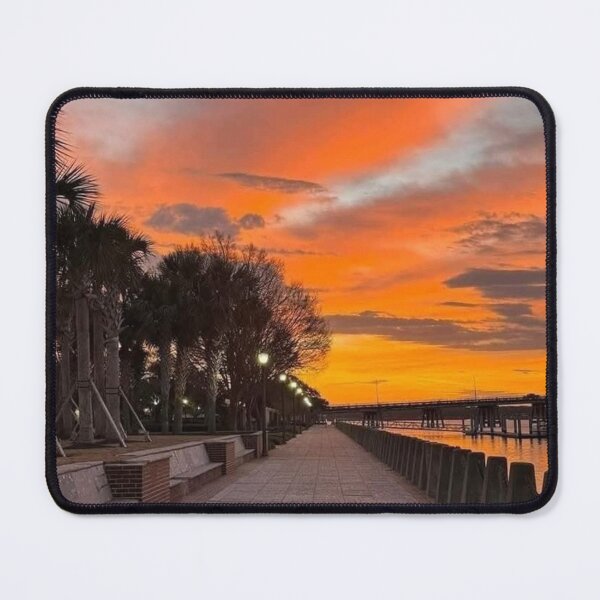 Item preview, Sun Rising Newcastle University bOver Snowy Peaks designed and sold by Arongraper.