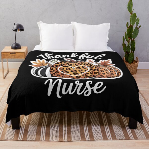 Item preview, Thankful Nurse Leopard Plaid Pumpkin Thanksgiving Day Nurse designed and sold by PeteHomenick.