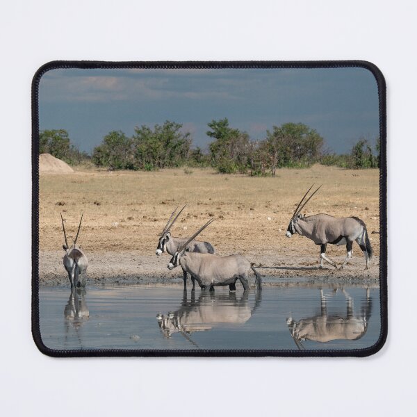 Item preview, Silent Guardians of the Waterhole — Gemsbok Reflections Under a Storm‑Lit Sky designed and sold by DavideAntoniani.