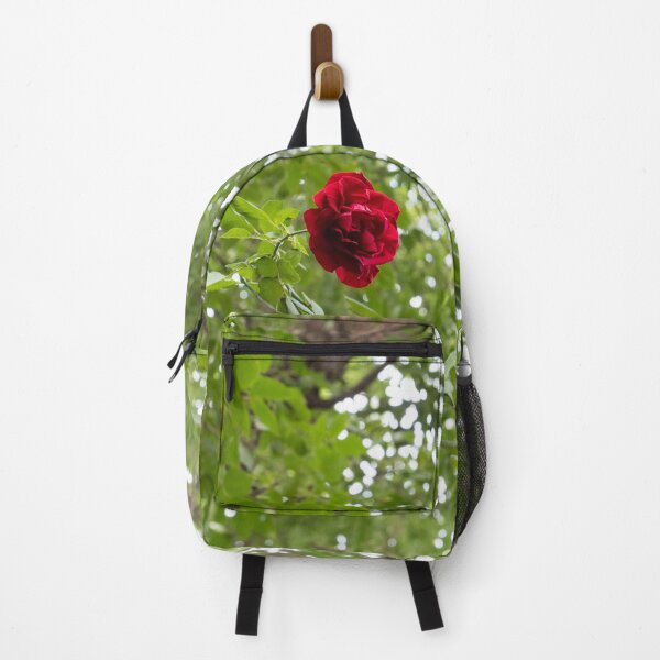 Item preview, Solitary Red Rose Against Green Treetop Leaves designed and sold by Georgia Mizuleva.