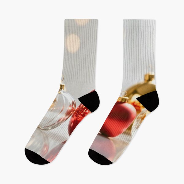 Item preview, Red, Gold, and Clear Christmas Baubles with Soft Reflections on White Surface and Warm Bokeh Lights designed and sold by Mimoshi ⭐⭐⭐⭐⭐.