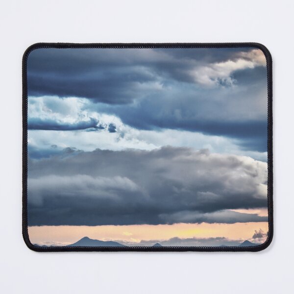 Item preview, Storm clouds casting shadows on distant mountains designed and sold by pcole123.