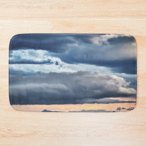 Item preview, Storm clouds casting shadows on distant mountains designed and sold by pcole123.