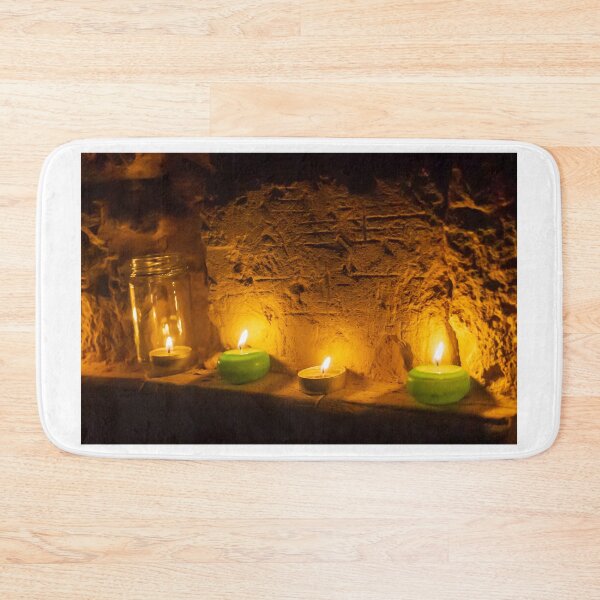 Item preview, Cozy Candlelight Scene With Green Tea Light Candles Against Rustic Brick Wall designed and sold by Nmallia.