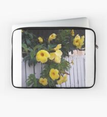 yellow flowers on the gatedoor Laptop Sleeve