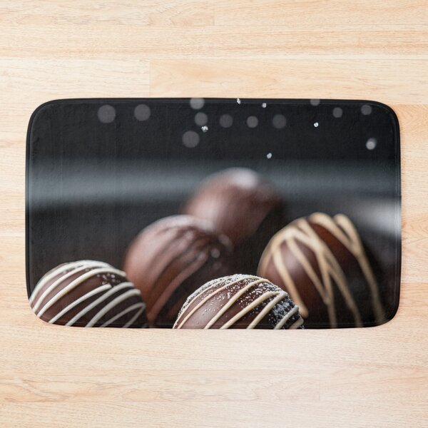 Item preview, Chocolate truffles on black plate designed and sold by anytka.