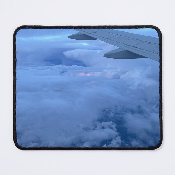 Item preview, Cloudy view from plane window, sunset sunrise designed and sold by maggiemuffin13.