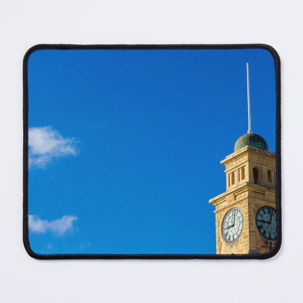 Item preview, Historic Clock Tower Against a Clear Blue Sky with Sparse Clouds designed and sold by Nmallia.