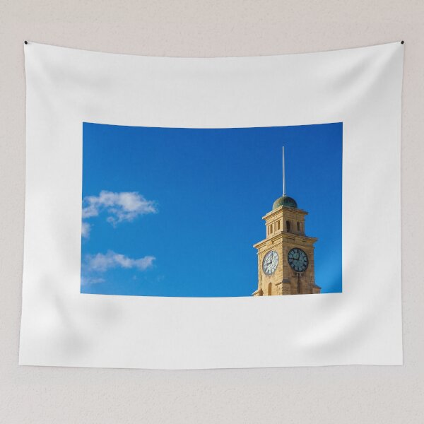 Item preview, Historic Clock Tower Against a Clear Blue Sky with Sparse Clouds designed and sold by Nmallia.