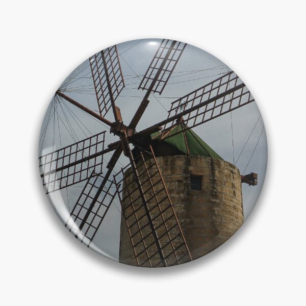 Item preview, Old Stone Windmill With Large Wooden Blades Against Clear Sky, Historic Rural Landmark designed and sold by Nmallia.
