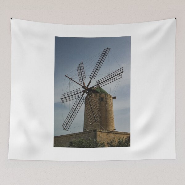 Item preview, Old Stone Windmill With Large Wooden Blades Against Clear Sky, Historic Rural Landmark designed and sold by Nmallia.