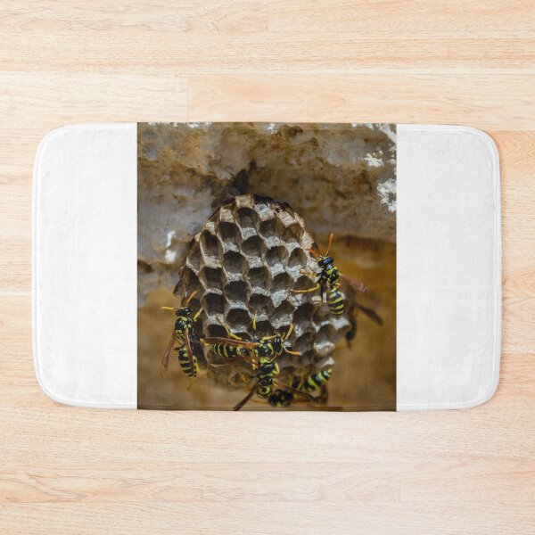 Item preview, Wasp Nest Close-Up With Yellow And Black Wasps On Hexagonal Honeycomb In Rough Wall designed and sold by Nmallia.