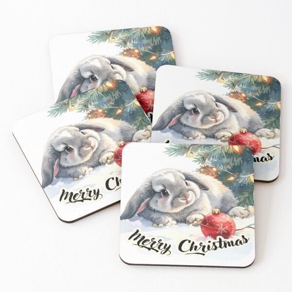 Item preview, Grey ram rabbit lies in the snow under the Christmas tree, Christmas tree ball Merry Christmas Text designed and sold by LiskoDesign.