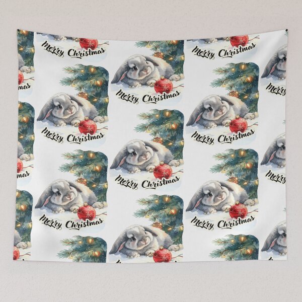 Item preview, Grey ram rabbit lies in the snow under the Christmas tree, Christmas tree ball Merry Christmas Text designed and sold by LiskoDesign.