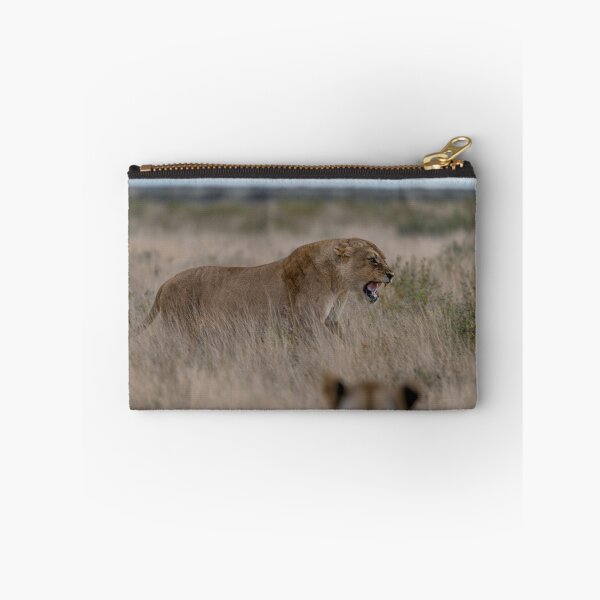 Item preview, Her Line in the Grass — Lioness Warning the Subadults, Etosha National Park designed and sold by DavideAntoniani.