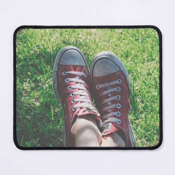 Item preview, Worn Red Sneakers Lying in Green Grass - Summer Chill Aesthetic designed and sold by MDB_Shop.