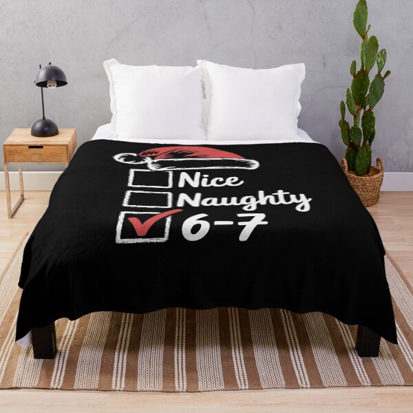 Item preview, Funny 6-7 Meme Checklist Santa Hat Christmas Humor Tee designed and sold by AScribbler0.