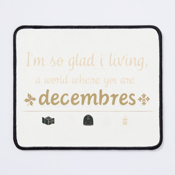 Item preview, I’m So Glad I Live In A World Where There Are Decembers | Cozy Winter Reading Aesthetic T‑Shirt designed and sold by GAIDREDA.