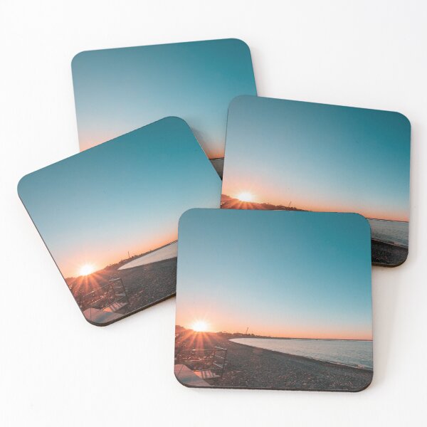 Item preview, Sunrise Radiance: Starburst Over the Curved Pebble Beach designed and sold by MDB_Shop.