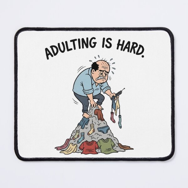 Item preview, Adulting Is Hard T-Shirt: Funny Grumpy Cartoon Man Laundry Day - Retro 80s Comic Style designed and sold by lamiarte.
