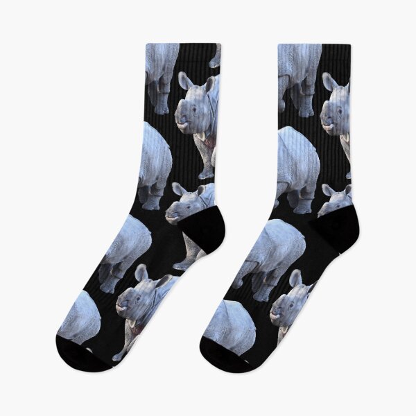 Item preview, Baby rhinoceros – toddling full of joie de vivre / Swiss Artwork Photography designed and sold by Raphael Wolf.