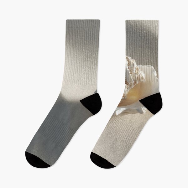 Item preview, Shell resting on soft sandy surface designed and sold by anytka.