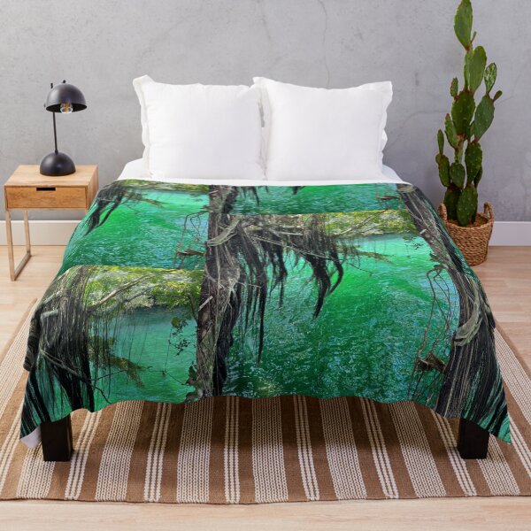 Item preview, Hanging Tree Roots Over Shimmering Emerald Green Water designed and sold by TrisaThyme.