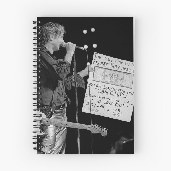 Item preview, Musician Rick Springfield Holding A Sign From A Fan - BW Photograph designed and sold by ConcertImages.