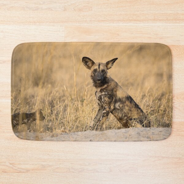 Item preview, African Wild Dog of Savuti — Pup at the Den, Botswana designed and sold by DavideAntoniani.