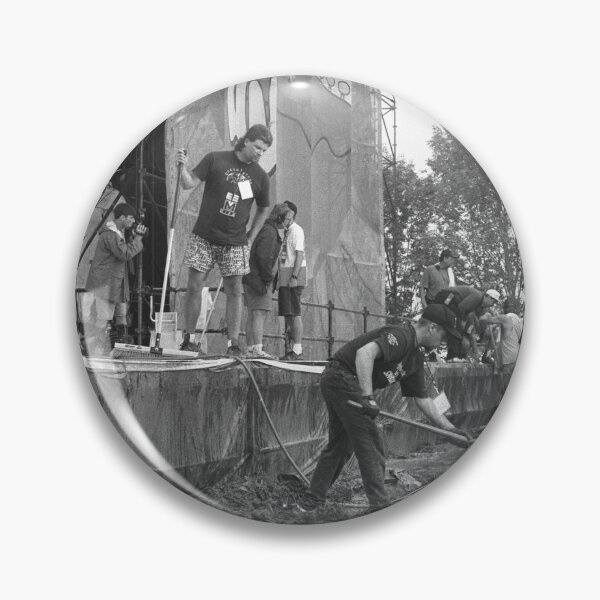 Item preview, Stage Hands Shoveling Mud And Grass At Woodstock 94 designed and sold by ConcertImages.