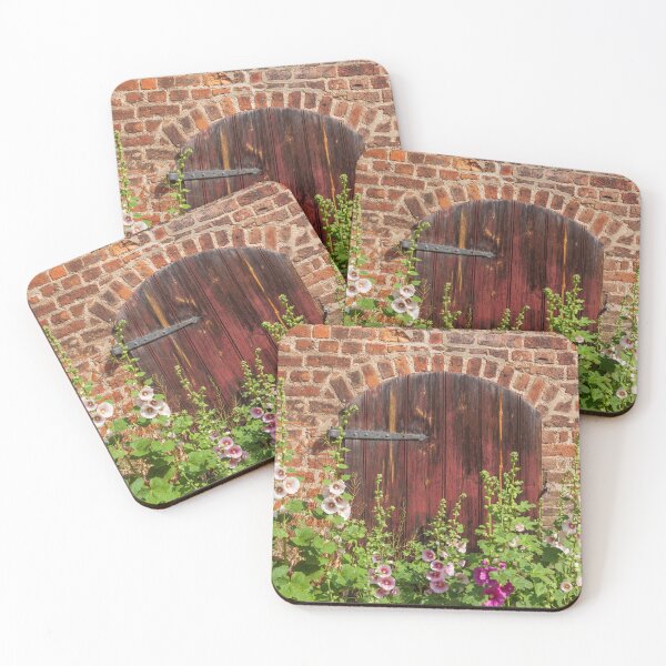 Item preview, Flowering hollyhocks in front of a gate on a brick wall, Germany designed and sold by Torsten  Krüger.