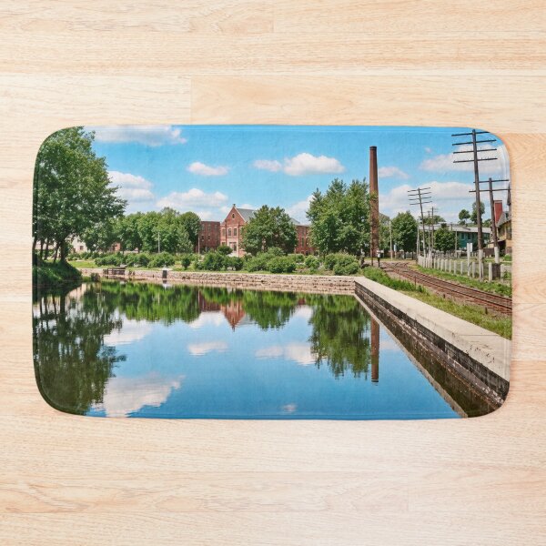 Item preview, Tranquil Lake Scene with Historic Buildings & Railroad Tracks designed and sold by plugsnpixels.