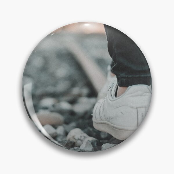 Item preview, White Sneaker Balancing on Moody Railroad Track designed and sold by MDB_Shop.