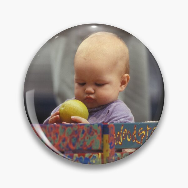 Item preview, A Toddler Checking His fruit At Woodstock 94 - Photograph designed and sold by ConcertImages.