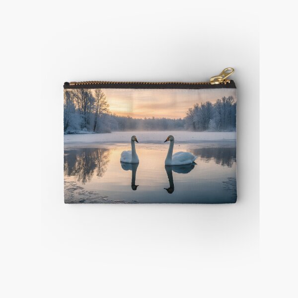 Item preview, Two swans floating on a partially frozen lake at sunrise designed and sold by homydesign.