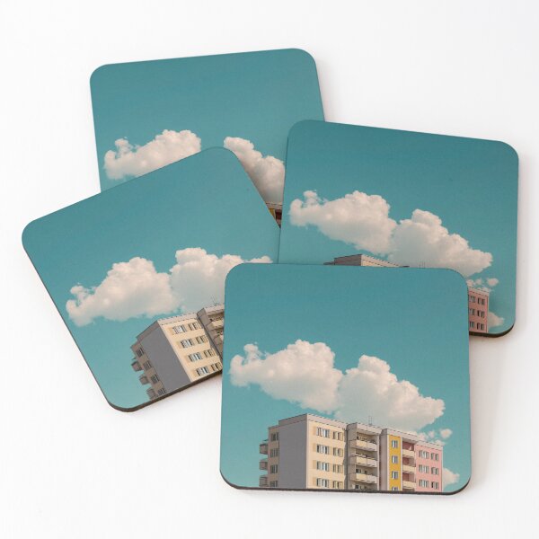 Item preview, Colourful building under a blue sky with clouds designed and sold by Pink & California.