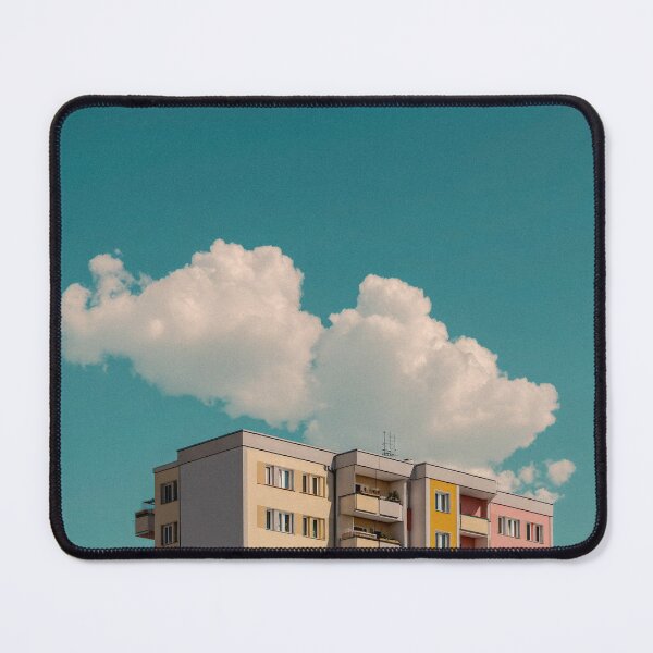 Item preview, Colourful building under a blue sky with clouds designed and sold by Pink & California.