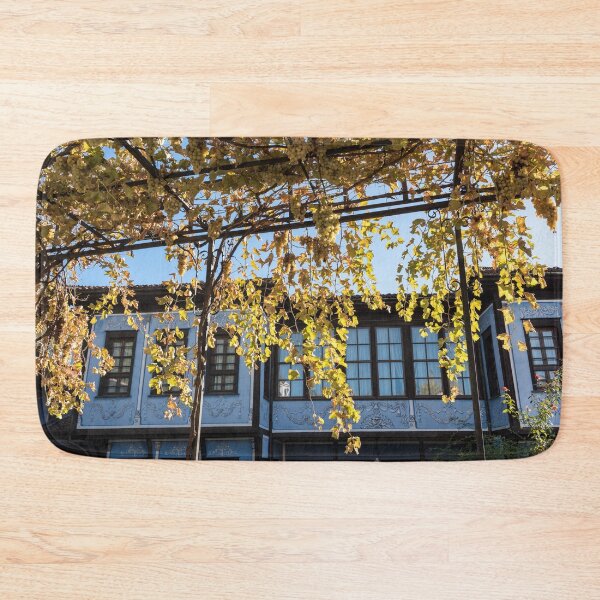 Item preview, Sunlit Grapevine Pergola Over Charming Blue House designed and sold by Georgia Mizuleva.