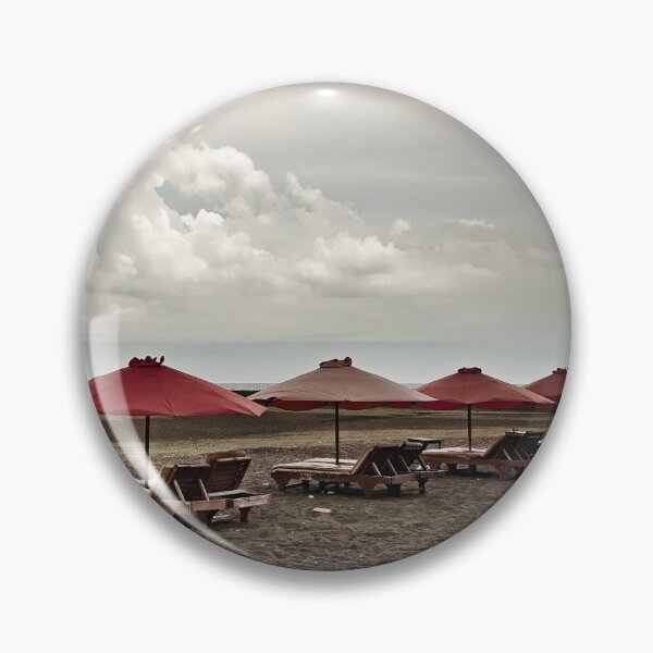 Item preview, Volcanic beach and dramatic red parasols designed and sold by franck380.