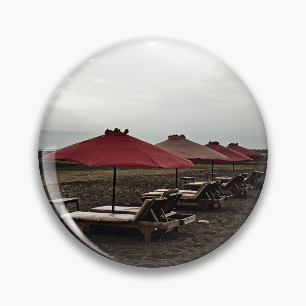 Item preview, Volcanic beach and dramatic red parasols designed and sold by franck380.