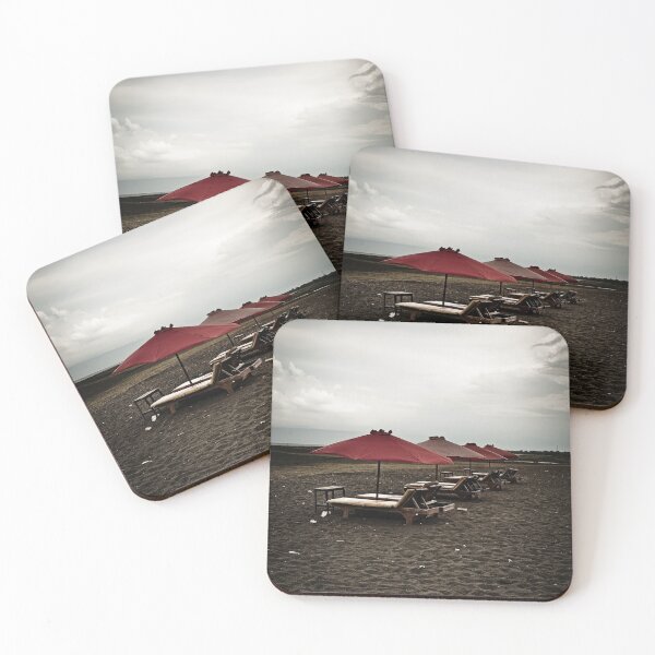 Item preview, Volcanic beach and dramatic red parasols designed and sold by franck380.