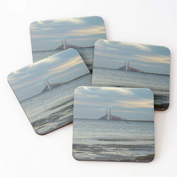Item preview, The Sunshine Skyway Bridge stretches gracefully across Tampa Bay at dawn, bathed in soft golden light as the new day begins designed and sold by EyezWatchin.