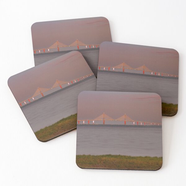 Item preview, The Sunshine Skyway Bridge stretches gracefully across Tampa Bay at dawn, bathed in soft golden light as the new day begins designed and sold by EyezWatchin.