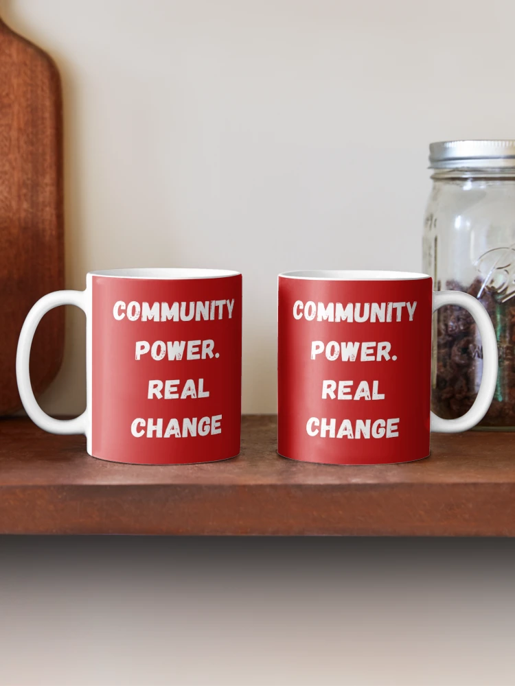 Thumbnail 2 of 6, Coffee Mug, Community Power. Real Change designed and sold by Akira Design Store.