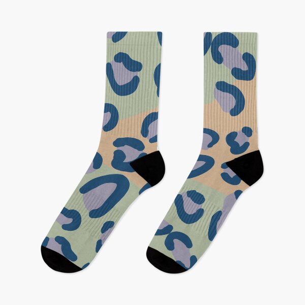 Item preview, Seamless leopard pattern with blue and purple spots Wavy sage green and brown background in a flat graphic style designed and sold by Crispifly.